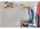 Organized closet featuring shelving and hanging rods with a neutral wall color offering ample storage at 106 Elmsford St, Durham, NC 27703