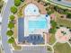 Overhead view of a community pool featuring a wading area, lap lanes, and adjacent playground at 106 Elmsford St, Durham, NC 27703
