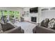 Cozy living room with a fireplace, built-in shelving, and comfortable seating at 106 Elmsford St, Durham, NC 27703