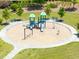Aerial view of the community playground featuring swings, slide, and seating areas at 106 Elmsford St, Durham, NC 27703