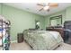 Cozy bedroom featuring a ceiling fan, dresser, and convenient storage options at 109 D A King Dr, Willow Springs, NC 27592
