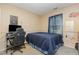 Bedroom with a blue comforter, computer desk and chair at 109 D A King Dr, Willow Springs, NC 27592