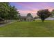 Charming single-story home with gray siding, complemented by a spacious front yard and inviting curb appeal at 109 D A King Dr, Willow Springs, NC 27592