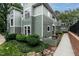 Attractive condo features a lush, landscaped yard with mature plantings at 1111 Parkridge Ln # 103, Raleigh, NC 27605