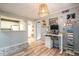 Bright office space featuring a modern desk, shelving and natural light at 1111 Parkridge Ln # 103, Raleigh, NC 27605