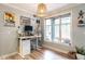 Bright office area with a large window, modern desk and decor at 1111 Parkridge Ln # 103, Raleigh, NC 27605