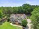 Charming traditional home featuring a welcoming front porch and professionally landscaped front yard at 113 Cedardale Ct, Clayton, NC 27520