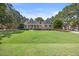 Well-maintained home with lush lawn and mature trees in a desirable neighborhood at 113 Cedardale Ct, Clayton, NC 27520