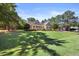 Stunning home with landscaped lawn, mature trees, and a welcoming front porch at 113 Cedardale Ct, Clayton, NC 27520