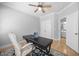 This office features a large desk, comfortable chair, and access to an ensuite bathroom at 113 Cedardale Ct, Clayton, NC 27520