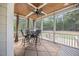 Relaxing screened porch with wood ceiling, patio furniture, and backyard views at 113 Cedardale Ct, Clayton, NC 27520