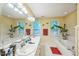 Bright bathroom with dual sinks, a large mirror, and a separate soaking tub at 115 Redbay Ln, Clayton, NC 27527