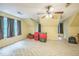 Upstairs bedroom with neutral carpeting and a ceiling fan at 115 Redbay Ln, Clayton, NC 27527