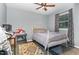 Cozy bedroom with natural light and decorative rug at 118 Lynn Rd, Durham, NC 27703