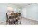 Cozy dining area with a four-chair table and view of a window at 118 Lynn Rd, Durham, NC 27703