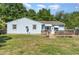 Charming home with a well-maintained lawn, deck, and inviting curb appeal at 118 Lynn Rd, Durham, NC 27703