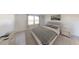 A relaxing main bedroom is bright and airy with its neutral tones and comfortable furniture at 1208 Solace Way, Rolesville, NC 27571