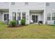 Backyard features well-maintained lawn and patio with seating, ideal for outdoor enjoyment at 1213 Grenshaw Dr, Morrisville, NC 27560