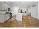 Spacious kitchen showcasing a large island, stainless appliances, and an abundance of storage at 1213 Grenshaw Dr, Morrisville, NC 27560