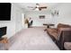 Bright, open living room provides multiple seating areas and lots of space at 1213 Grenshaw Dr, Morrisville, NC 27560