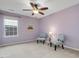 Charming bedroom with stylish chairs, side table, and a large window for natural light at 136 Shadow Hawk Dr, Durham, NC 27713