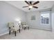 Bright bedroom with two stylish chairs and a large window for natural light at 136 Shadow Hawk Dr, Durham, NC 27713