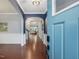 View from front door into hall of home; beautiful woodwork and hardwood flooring at 136 Shadow Hawk Dr, Durham, NC 27713