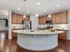 Open kitchen with granite countertops, stainless steel appliances and ample cabinet space at 136 Shadow Hawk Dr, Durham, NC 27713