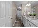 Stylish bathroom with a double vanity, granite countertop, and a shower-tub combo at 139 Carriage Hill Dr, Stem, NC 27581