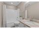 Bright bathroom featuring a tub and shower, toilet, and vanity with a marble countertop at 139 Carriage Hill Dr, Stem, NC 27581