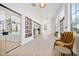 Hallway with a comfortable chair and natural light at 1633 Goldfinch Perch Ln, Knightdale, NC 27545