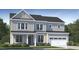Charming two-story home with neutral siding, a covered porch, attached garage, and well-maintained landscaping at 1637 Goldfinch Perch Ln, Knightdale, NC 27545