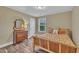 Cozy bedroom with wood floors and natural light from the bright window at 1920 Bright Kannon Way, Wendell, NC 27591