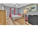 Comfortable bedroom with hardwood floors, natural light, and modern furnishings at 1920 Bright Kannon Way, Wendell, NC 27591