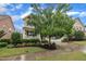 Beautiful home exterior boasting a lush lawn, attractive landscaping, and a welcoming covered front porch at 1920 Bright Kannon Way, Wendell, NC 27591