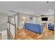 Spacious living room with hardwood floors, comfortable seating, and great natural light at 1920 Bright Kannon Way, Wendell, NC 27591