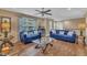 Cozy living room with hardwood floors, bright windows and comfortable seating at 1920 Bright Kannon Way, Wendell, NC 27591