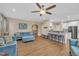 Open-concept living room with comfortable seating, kitchen bar, and a welcoming atmosphere at 1920 Bright Kannon Way, Wendell, NC 27591
