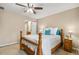 Comfortable bedroom with ceiling fan, wooden furniture and ensuite bathroom at 1984 Sadler Ave, Creedmoor, NC 27522