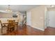 Inviting dining area with wood floors, stylish light fixture and easy access to the home's entry at 1984 Sadler Ave, Creedmoor, NC 27522