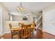 The dining room is open to the staircase, living room, and has a backyard view at 1984 Sadler Ave, Creedmoor, NC 27522