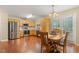 Eat-in kitchen with stainless steel appliances, ample counter space, and a wood dining table at 1984 Sadler Ave, Creedmoor, NC 27522