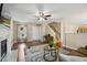 Open living room featuring hardwood floors, a staircase, and a cozy seating area at 1984 Sadler Ave, Creedmoor, NC 27522