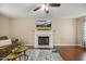 Inviting living room with fireplace, cozy sofa, and stylish decor for comfortable relaxation at 1984 Sadler Ave, Creedmoor, NC 27522