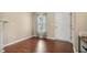 The space showcases hardwood floors, a well-lit window, and a sleek side table at 1984 Sadler Ave, Creedmoor, NC 27522