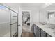 Bathroom with glass enclosed shower with a view of the bedroom at 200 Gill Farm Way, Franklinton, NC 27525