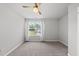 Bright bedroom featuring a ceiling fan, carpet, and window with natural light at 200 Gill Farm Way, Franklinton, NC 27525