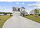 Charming two-story home with a manicured lawn, attached garage and welcoming front porch at 200 Gill Farm Way, Franklinton, NC 27525