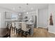 Open concept kitchen with stainless appliances, granite countertops, and a large island at 200 Gill Farm Way, Franklinton, NC 27525