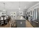 Open concept kitchen with stainless appliances, granite countertops, and a large island at 200 Gill Farm Way, Franklinton, NC 27525